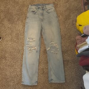 High waisted ripped light wash denim jeans